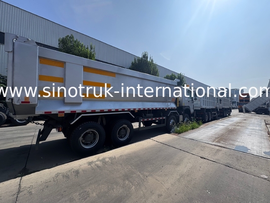SINOTRUK HOWO 371HP 8X4 Tipper Dump Truck Construction Old Front Face Military Bumper Per le zone minerarie Due luci di avvertimento Contenitore di tipo U