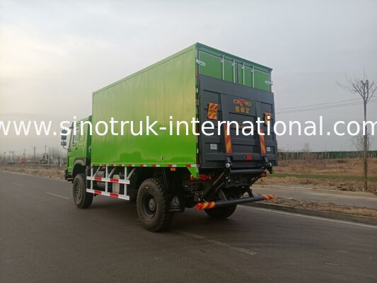 SINOTRUK Heavy Duty Truck with 4X4 LHD Drive Type, 5000*2300*2300 mm Cargo Tank, and 16T Rear Axle Capacity for Heavy Load Hauling Green