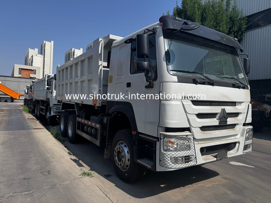 Motore SINOTRUK 371HP 6 × 4 LHD HOWO Autocarro con cassone ribaltabile Bianco 19-20CBM Sollevamento centrale