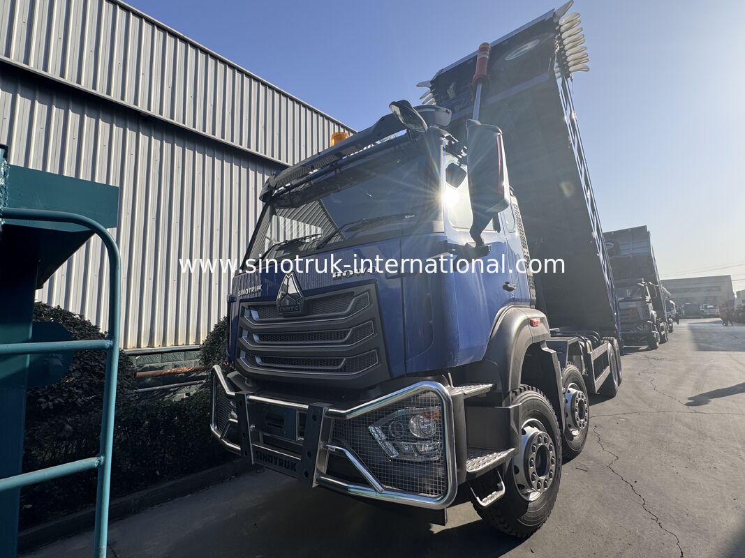 Sinotruk HOHAN Nuovo HOWO 8X4 Dump Truck 371hp H77L Cabina Blu Con telone elettrico RHD