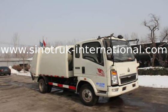 LHD 4X2 SINOTRUK HOWO ha compresso il camion 5 della raccolta dei rifiuti del compattatore - 6m3